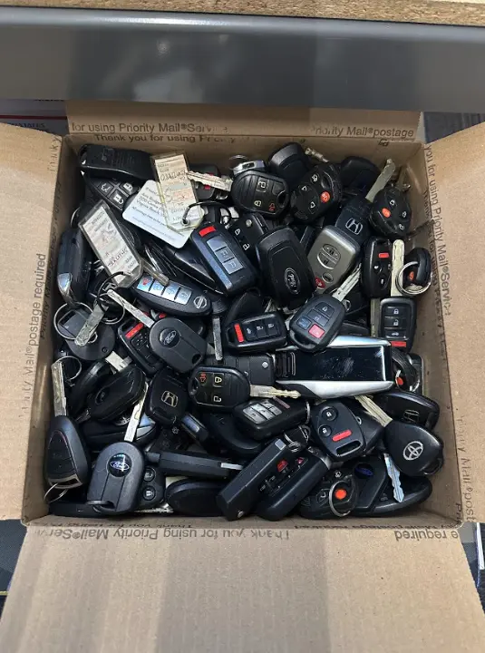 Box of unsorted key fobs